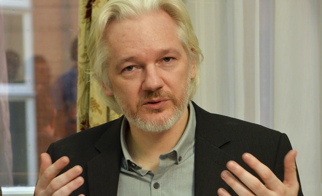 WikiLeaks founder Julian Assange gestures during a news conference at the Ecuadorian embassy in central London