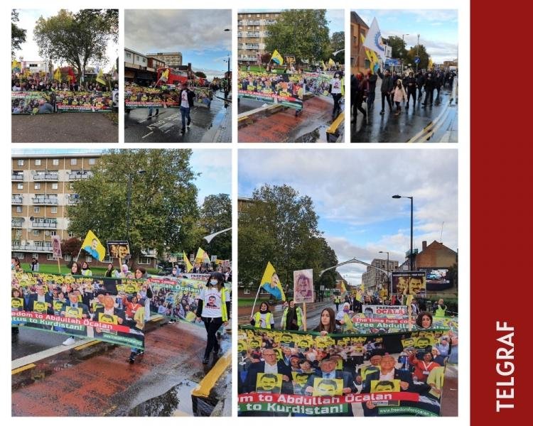 Yağmura rağmen kitle alkış, zılgıt ve sloganlar eşliğinde yürüyüşünü gerçekleştirdi